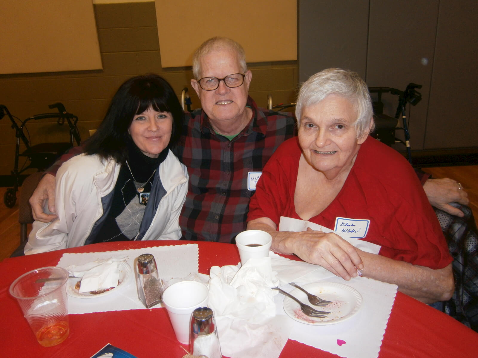 Wexford House Personal Care Assistant Ginny Brown with residents Rick Taylor and Glenda McFalls