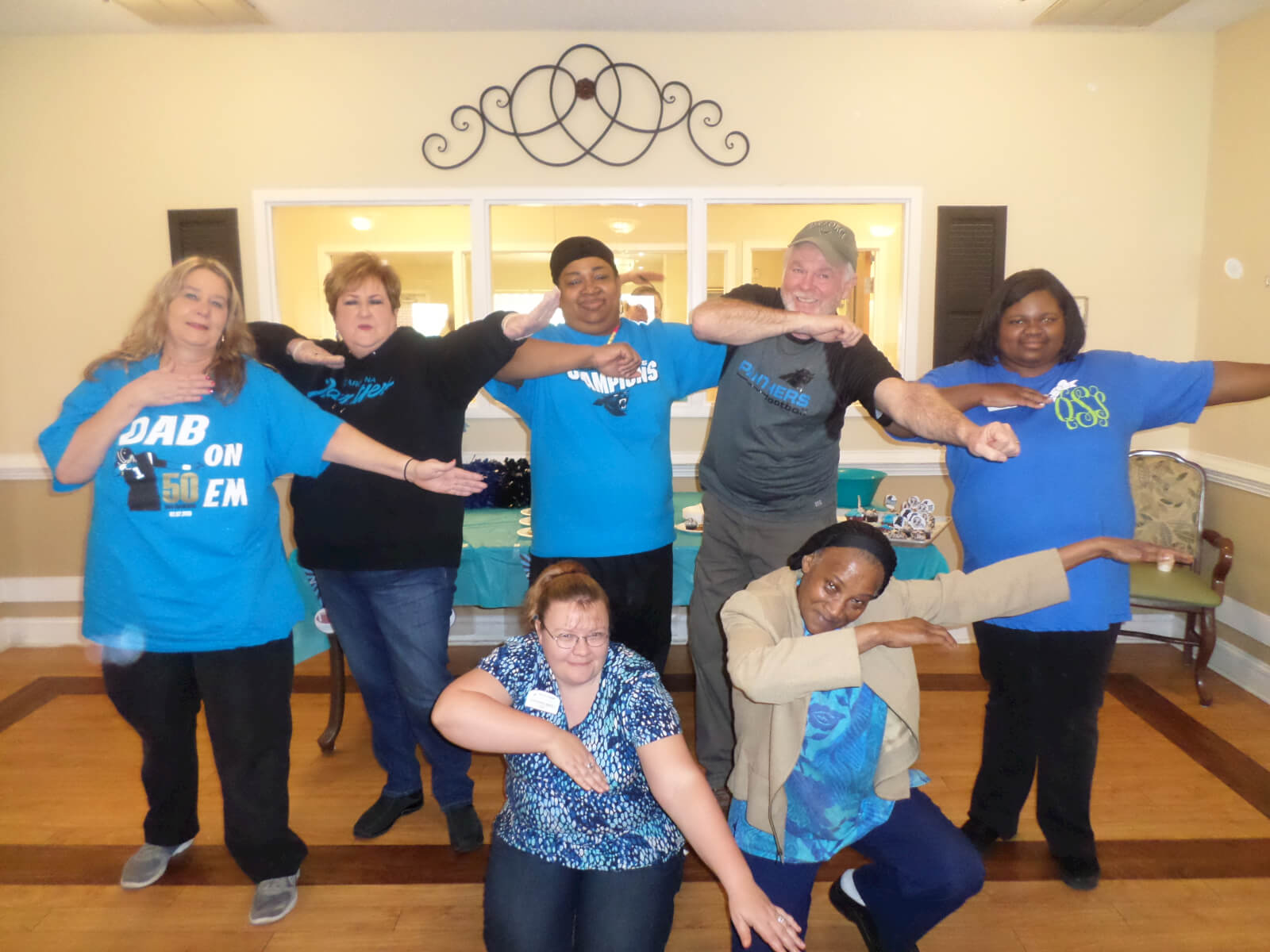 Hickory Village Memory Care staff members "dabbing" 