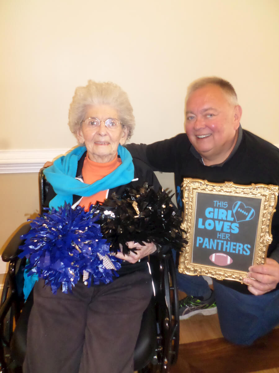 Keith Harris and his mother Virginia, a resident at Hickory Village Memory Care sporting Panthers Pride