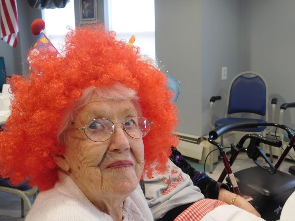 Westwood Commons resident Dorothy Harkness wearing a hat for national hat day