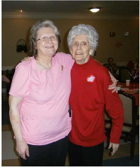 Cambridge House PCA Helen Walls and resident Helen Byers enjoy themselves at the senior living community’s annual Valentine’s Day party