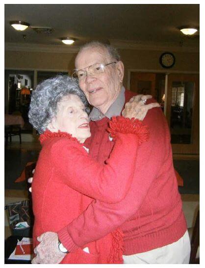 Cambridge House residents Frank and Mildred Ballew sharing an embrace