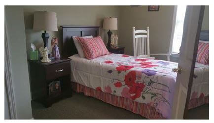 Resident bedroom at Pee Dee Gardens 