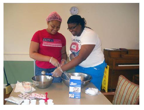 Alexandria and Audrianna “Nikki” Newkirk baking at Dayspring of Wallace