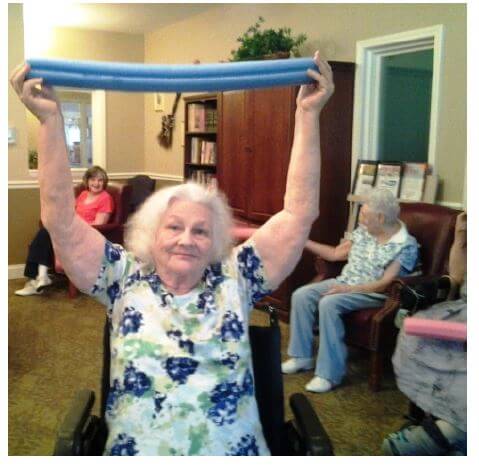 Heath House Resident Patricia Moose leading an exercise 