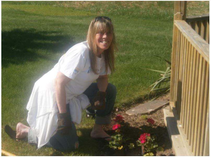 Nancy Bergen tending the flower beds at Horizons, a DePaul Senior Living Community in Canandaigua.