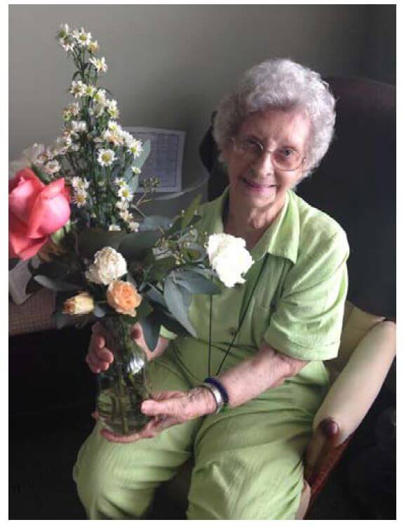 Pee Dee Gardens resident Betty Denham shows off her fresh bouquet. 