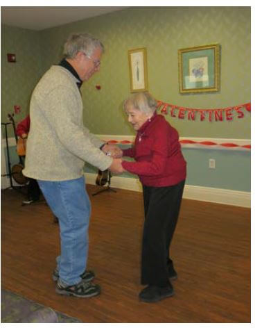 Woodcrest Commons resident Antonia Rios-Boubnoff dancing with her nephew in law. 