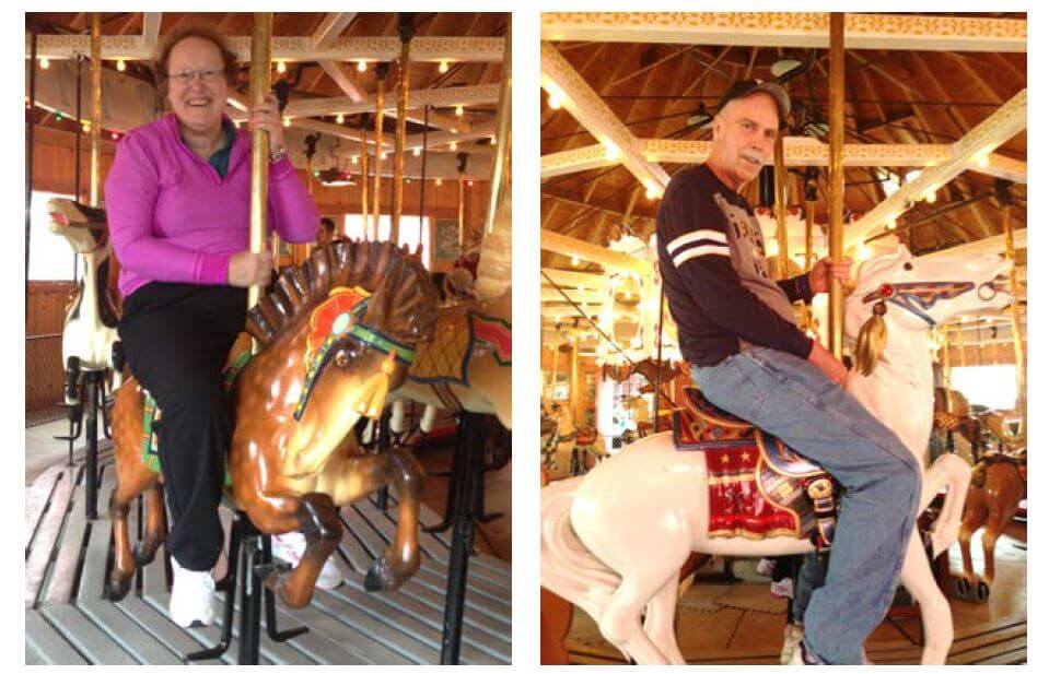 Woodcrest Commons residents Kathy Hart and Thomas Armstrong ride a 1916 carousel