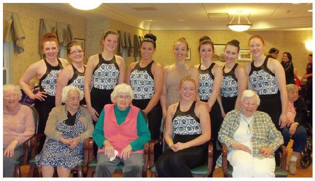 Spotlight dancers posing with Westwood Common's residents 