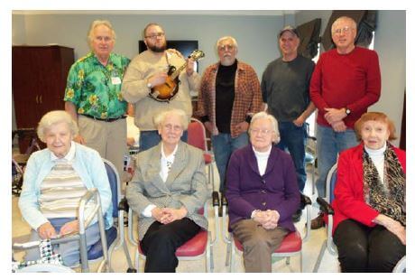 Westwood Commons Residents enjoying light classical and popular music performed by the Eastman Clarinet Duo