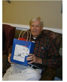 Bob Wright receiving a gift for National Volunteer Week