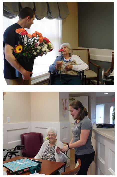 Brandon is pictured here with Joyce Hinshaw while Sara Villia presents a Gerber daisy to Dorothy Harkness.