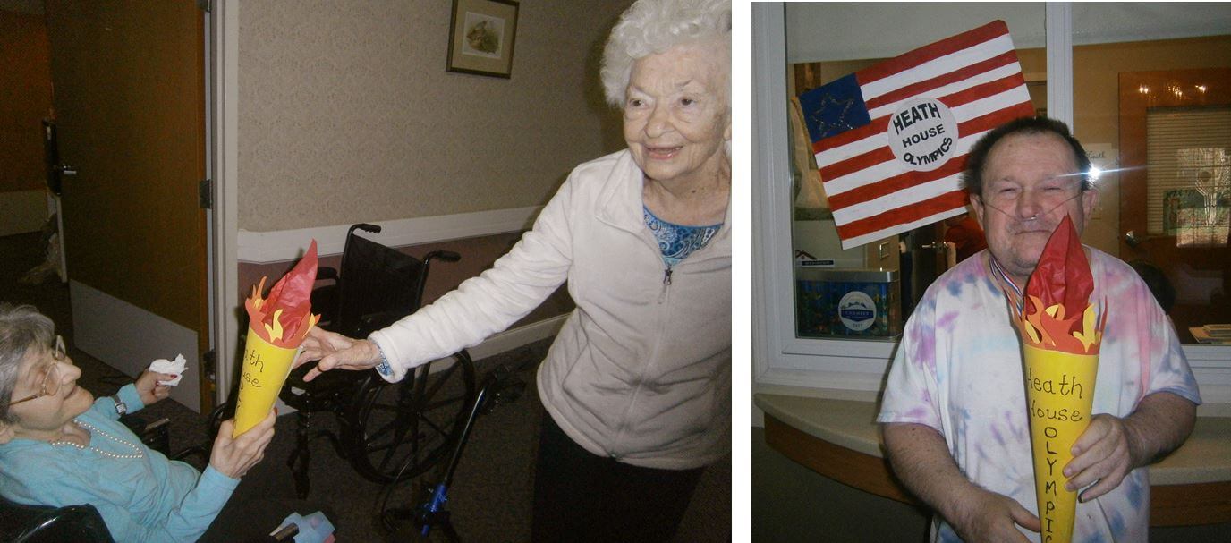 Pictured here with the Heath House Olympic torch are Merle Sherrill and Marise Kinsey, along with Roger Green who took the silver in Wii Bowling and the gold in the hole-in-one contest.